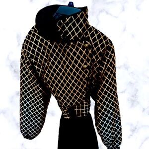 Black and gold skea one piece ski suit size 8